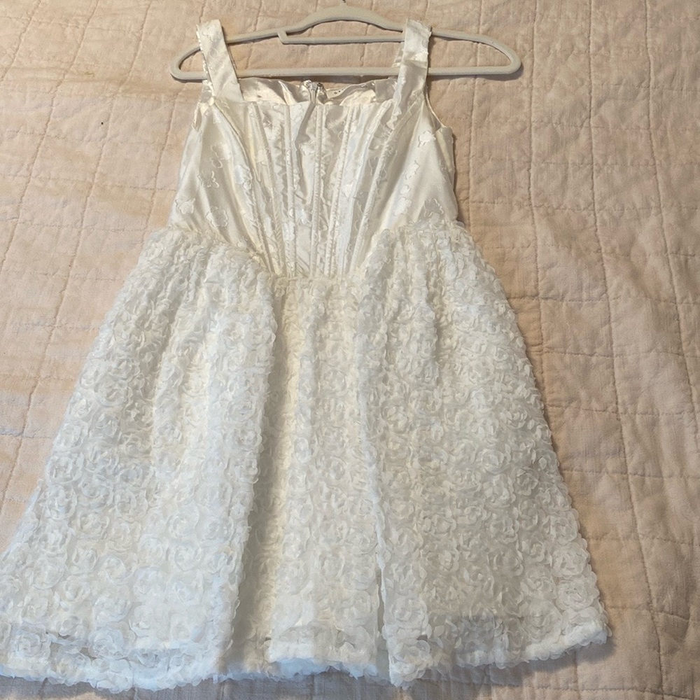 White corset mini dress with floral bottom